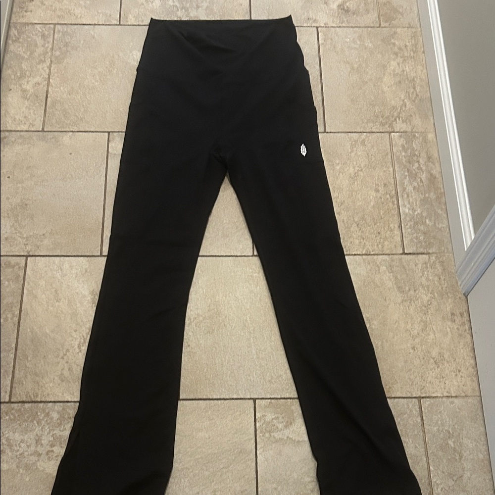 Elegant Black Women's Free People Flare Yoga pants